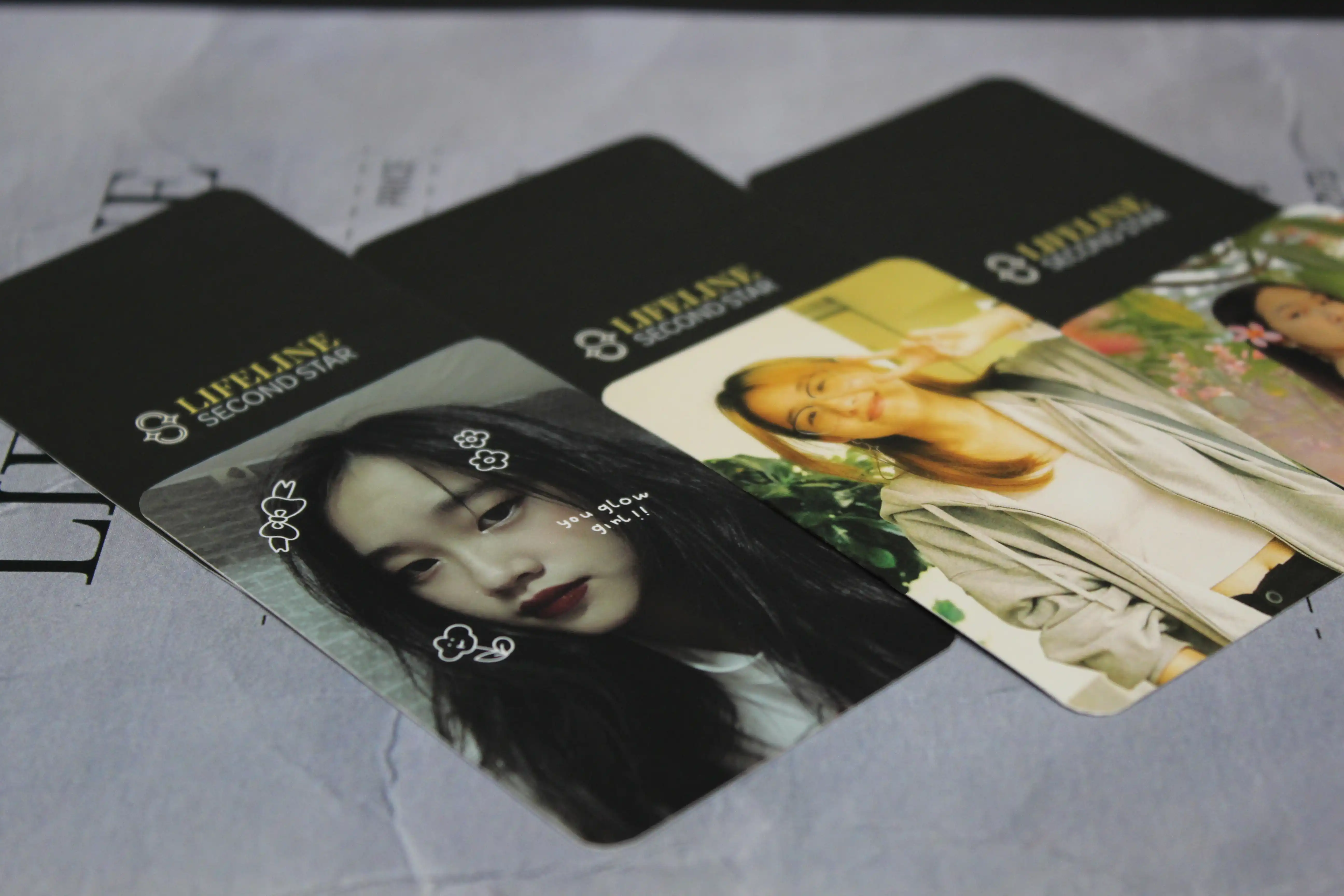 photocards laying on poster
